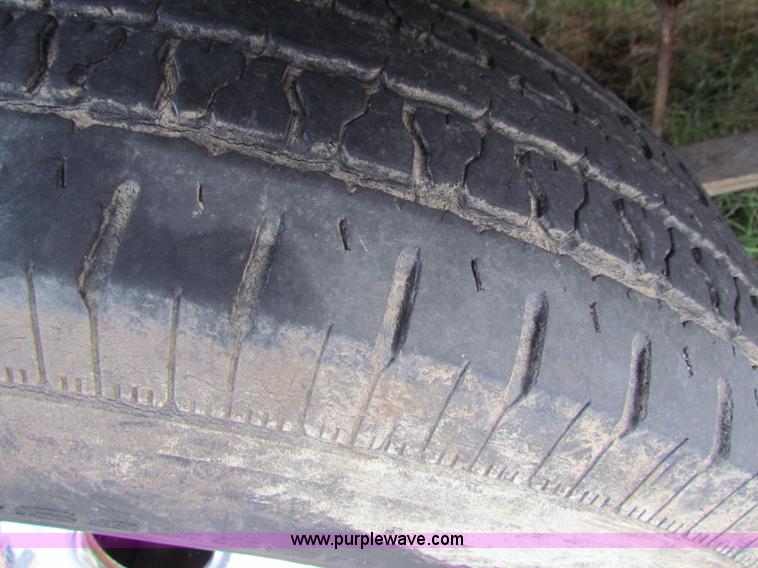 image for item B1659 1994 Ford Super Duty XLT roll back truck