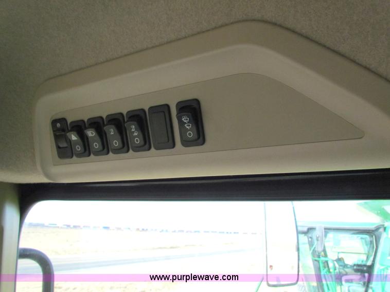 image for item E8166 2009 John Deere 9770 STS RWA combine