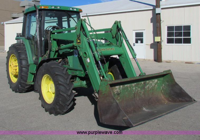 image for item E8171 1996 John Deere 6400 tractor