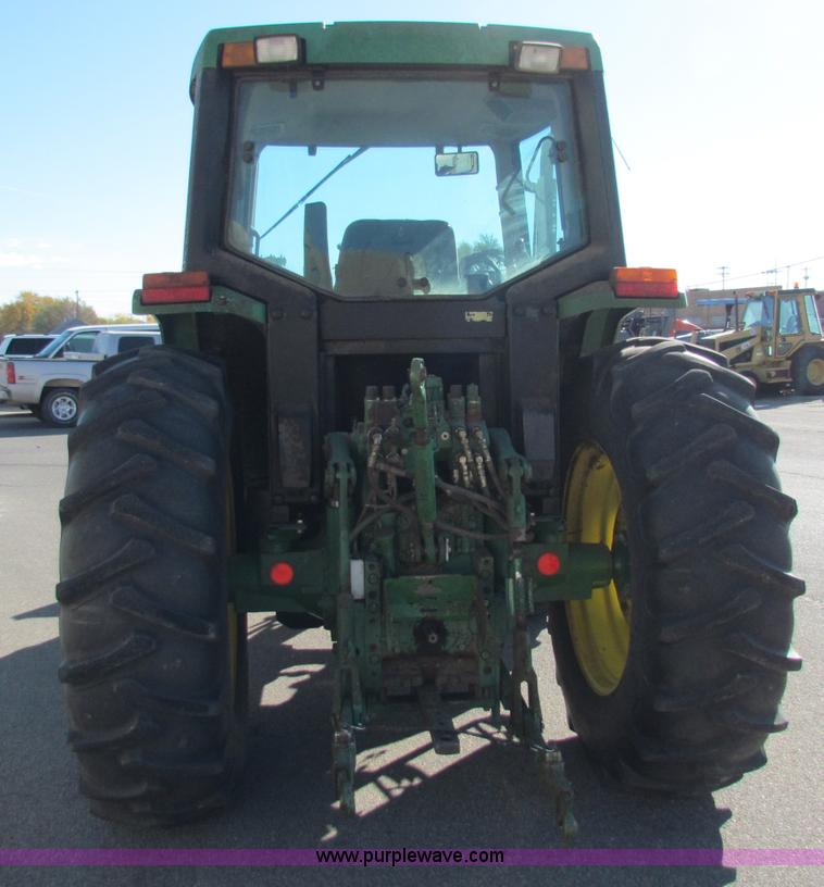 image for item E8171 1996 John Deere 6400 tractor