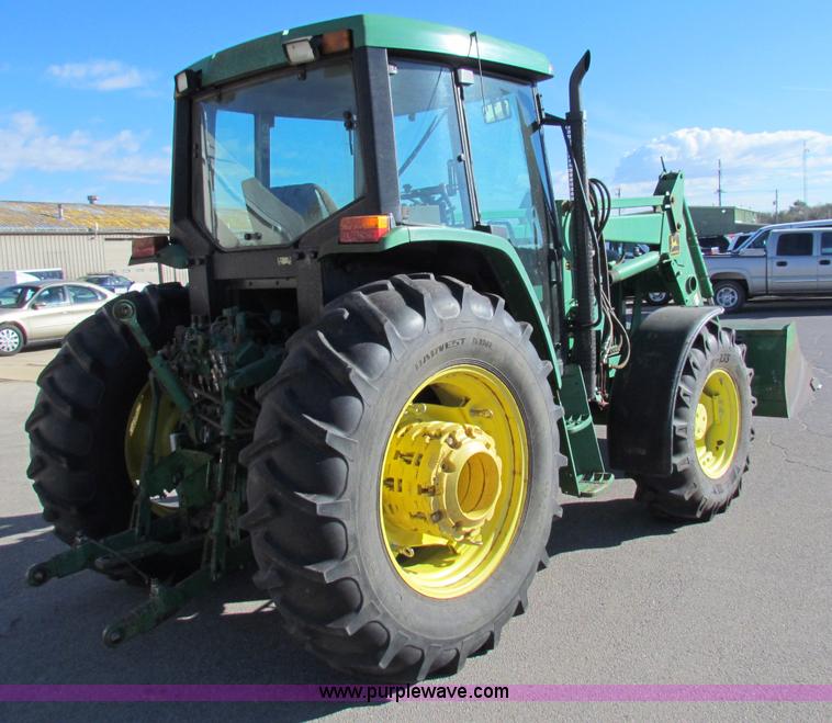 image for item E8171 1996 John Deere 6400 tractor