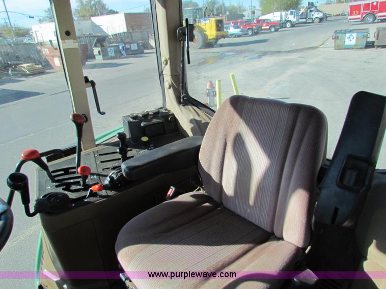 image for item E8171 1996 John Deere 6400 tractor