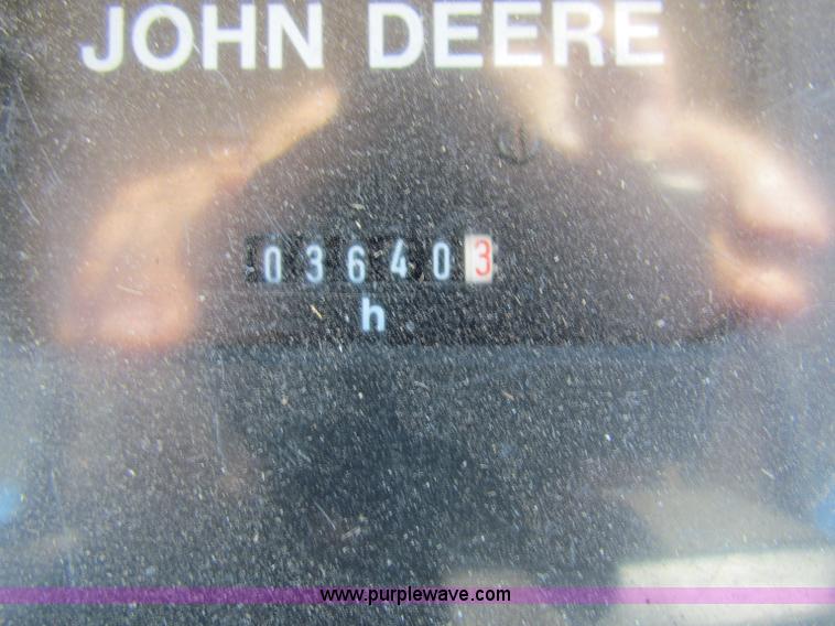 image for item E8171 1996 John Deere 6400 tractor