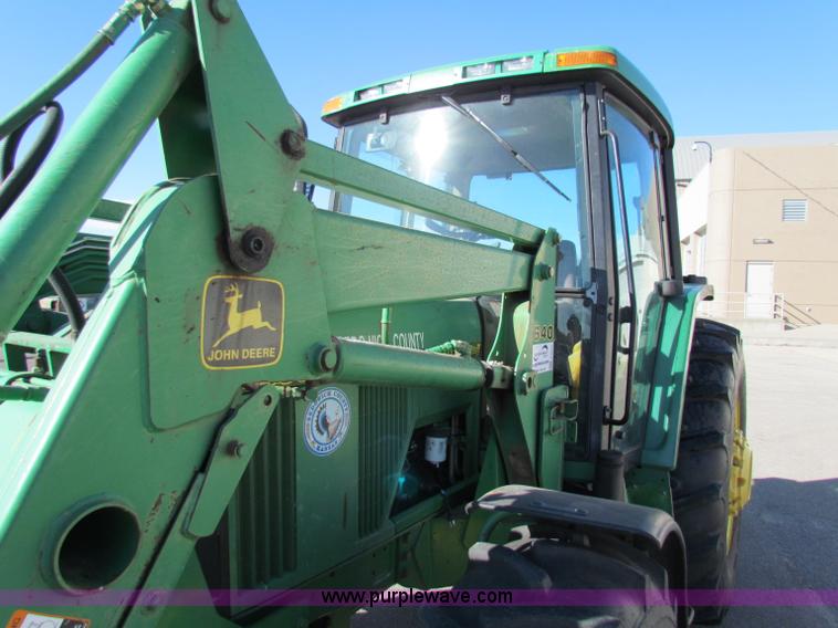 image for item E8171 1996 John Deere 6400 tractor