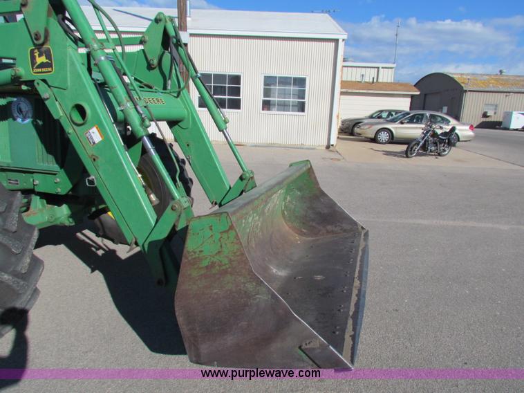 image for item E8171 1996 John Deere 6400 tractor