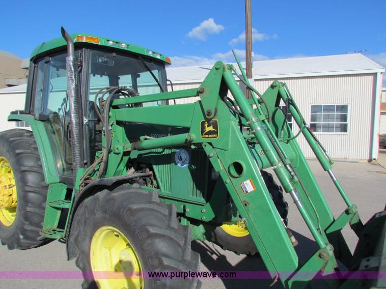 image for item E8171 1996 John Deere 6400 tractor