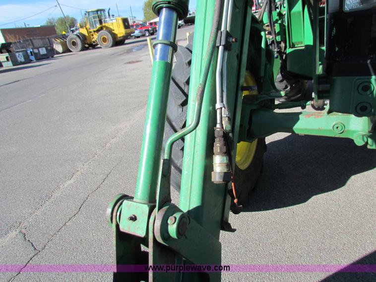 image for item E8171 1996 John Deere 6400 tractor