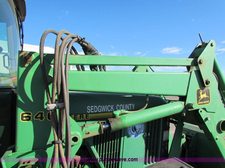 image for item E8171 1996 John Deere 6400 tractor