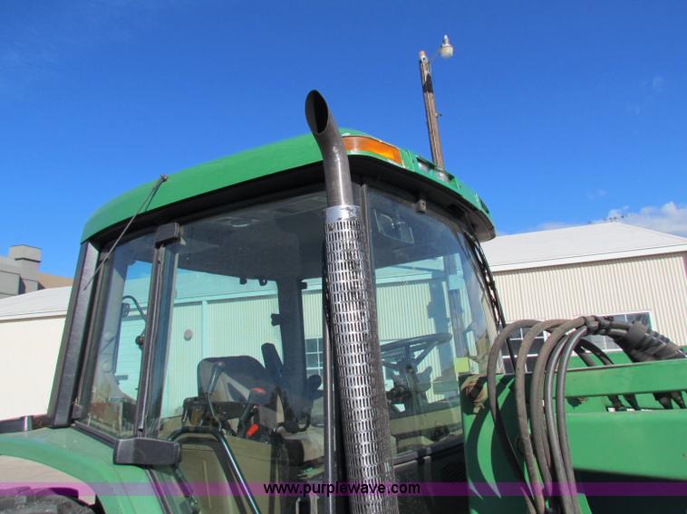 image for item E8171 1996 John Deere 6400 tractor
