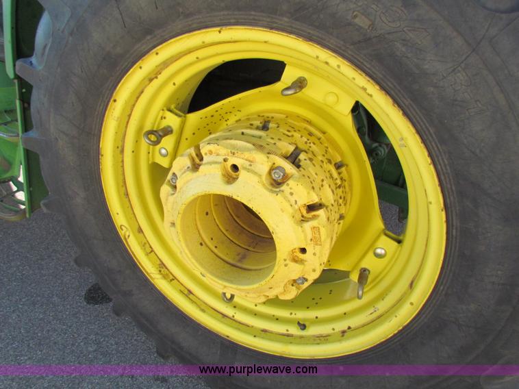 image for item E8171 1996 John Deere 6400 tractor