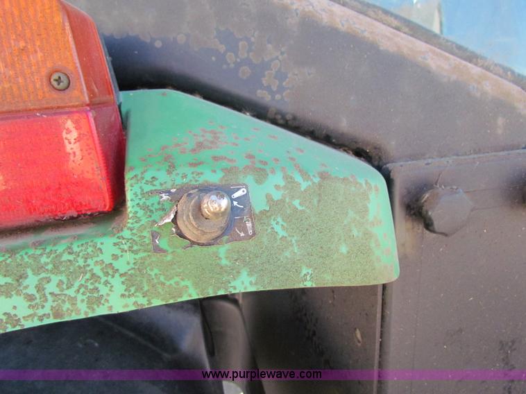 image for item E8171 1996 John Deere 6400 tractor