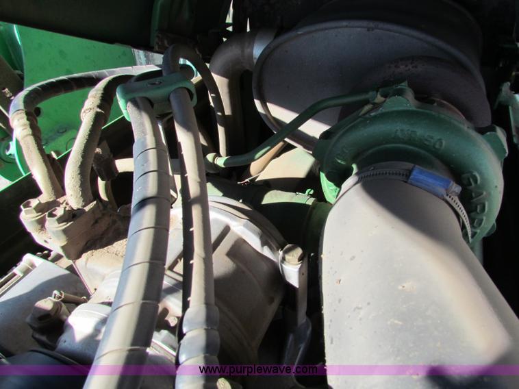 image for item E8171 1996 John Deere 6400 tractor