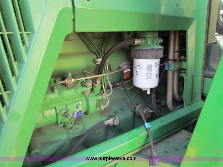 image for item E8171 1996 John Deere 6400 tractor