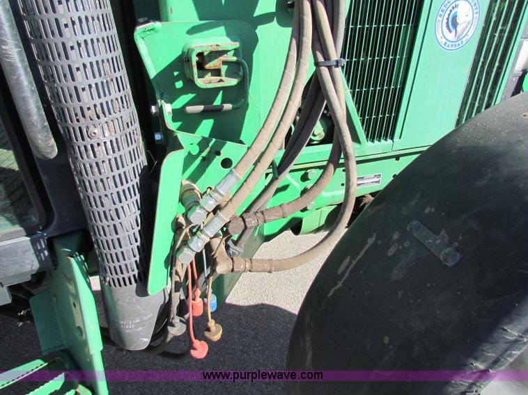 image for item E8171 1996 John Deere 6400 tractor