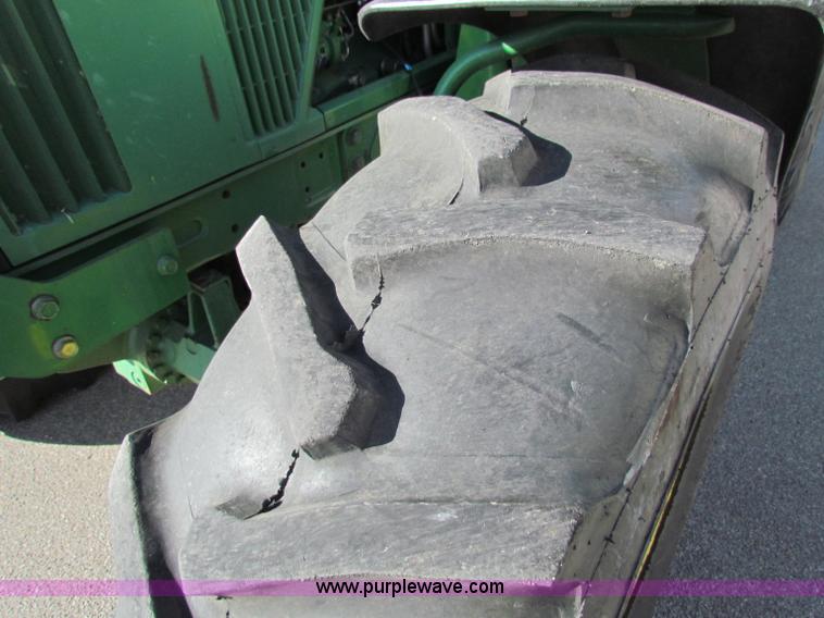 image for item E8171 1996 John Deere 6400 tractor