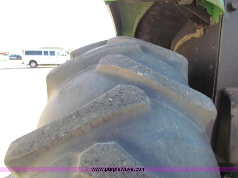 image for item E8171 1996 John Deere 6400 tractor