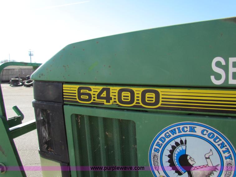 image for item E8171 1996 John Deere 6400 tractor