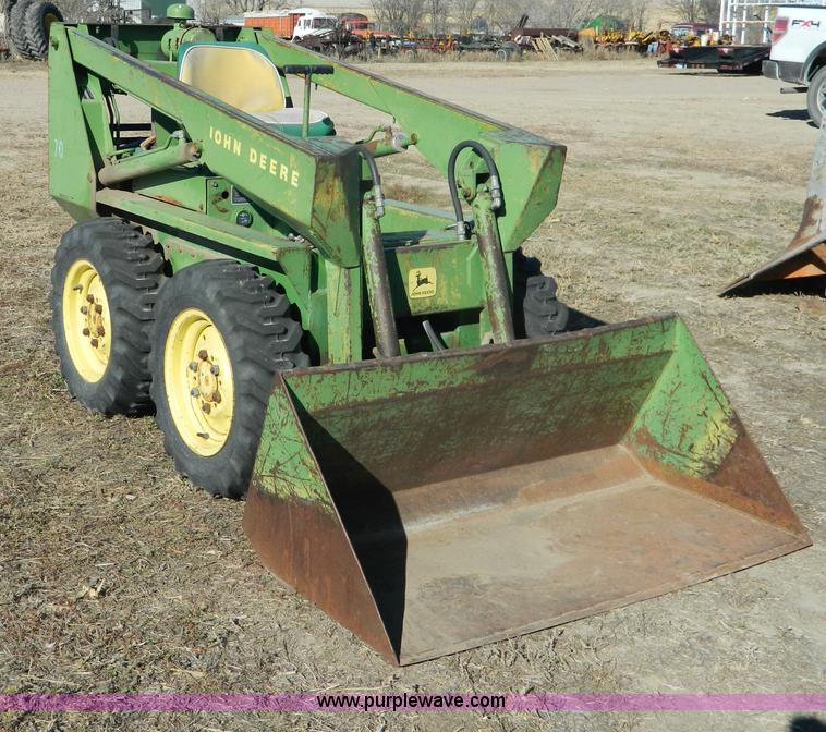 image for item G7619 John Deere 70 skid steer