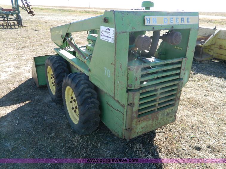 image for item G7619 John Deere 70 skid steer