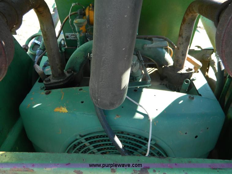 image for item G7619 John Deere 70 skid steer