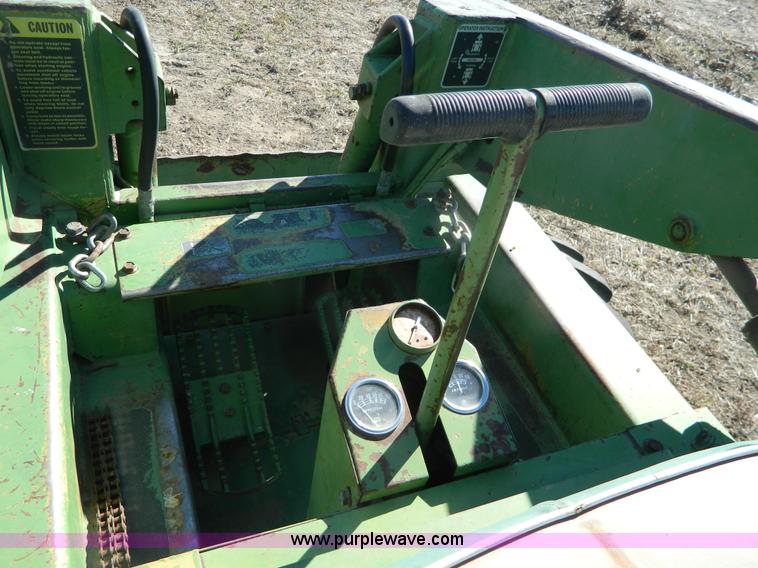 image for item G7619 John Deere 70 skid steer