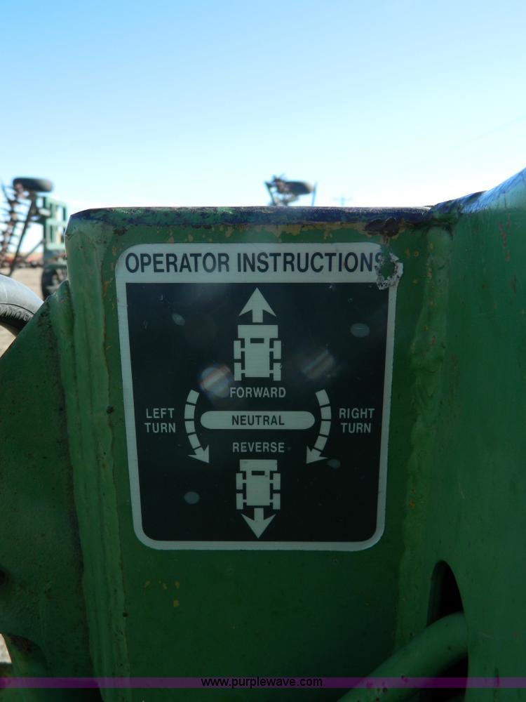 image for item G7619 John Deere 70 skid steer