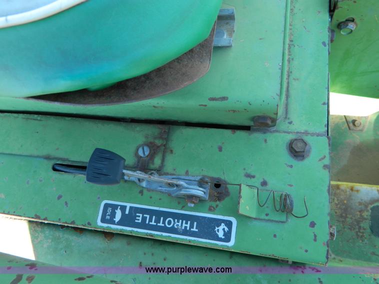 image for item G7619 John Deere 70 skid steer
