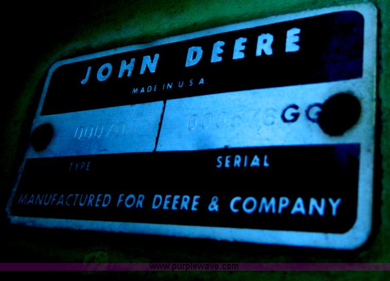 image for item G7619 John Deere 70 skid steer