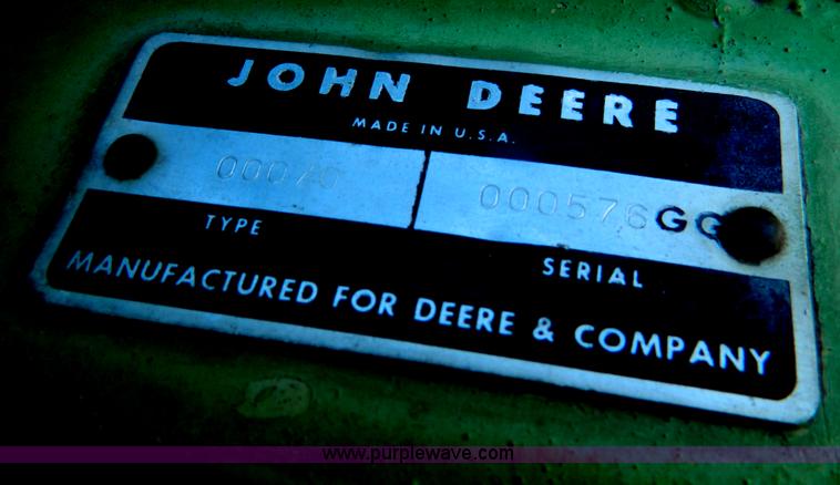 image for item G7619 John Deere 70 skid steer