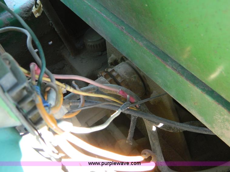 image for item G7619 John Deere 70 skid steer