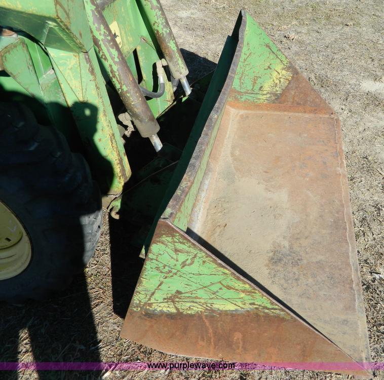 image for item G7619 John Deere 70 skid steer