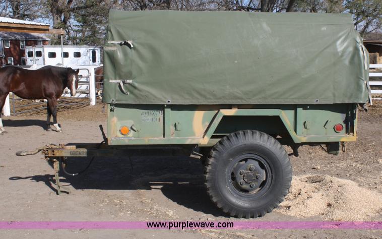 image for item F2515 Army trailer with racks and tarp