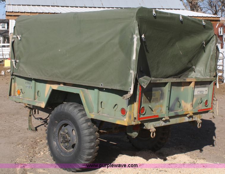 image for item F2515 Army trailer with racks and tarp