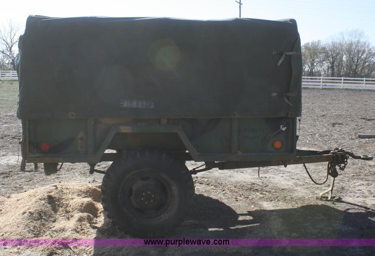 image for item F2515 Army trailer with racks and tarp