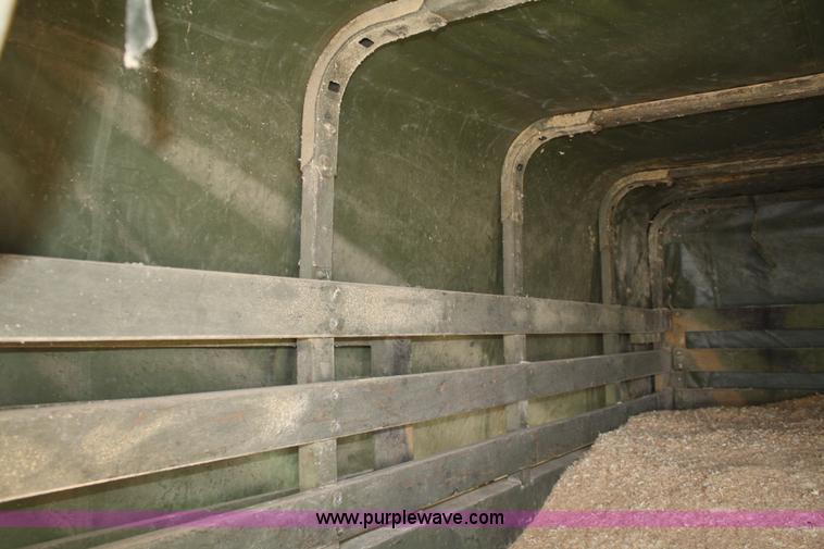 image for item F2515 Army trailer with racks and tarp