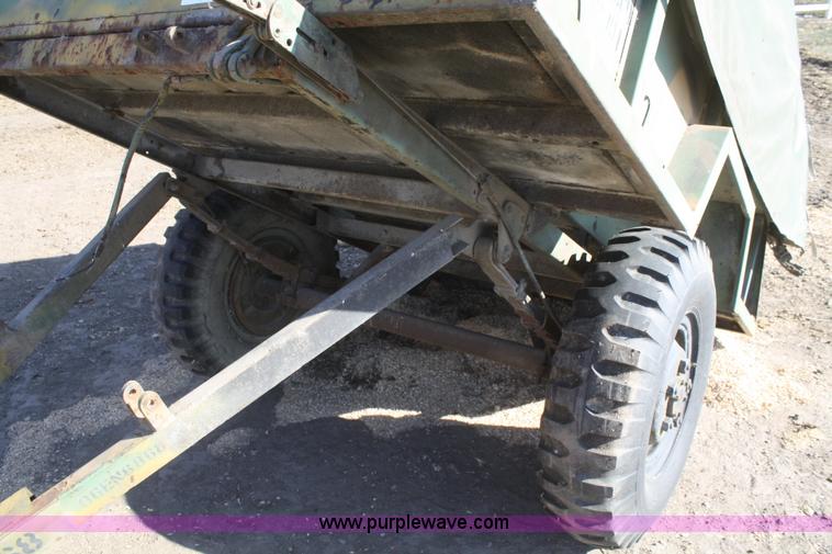 image for item F2515 Army trailer with racks and tarp