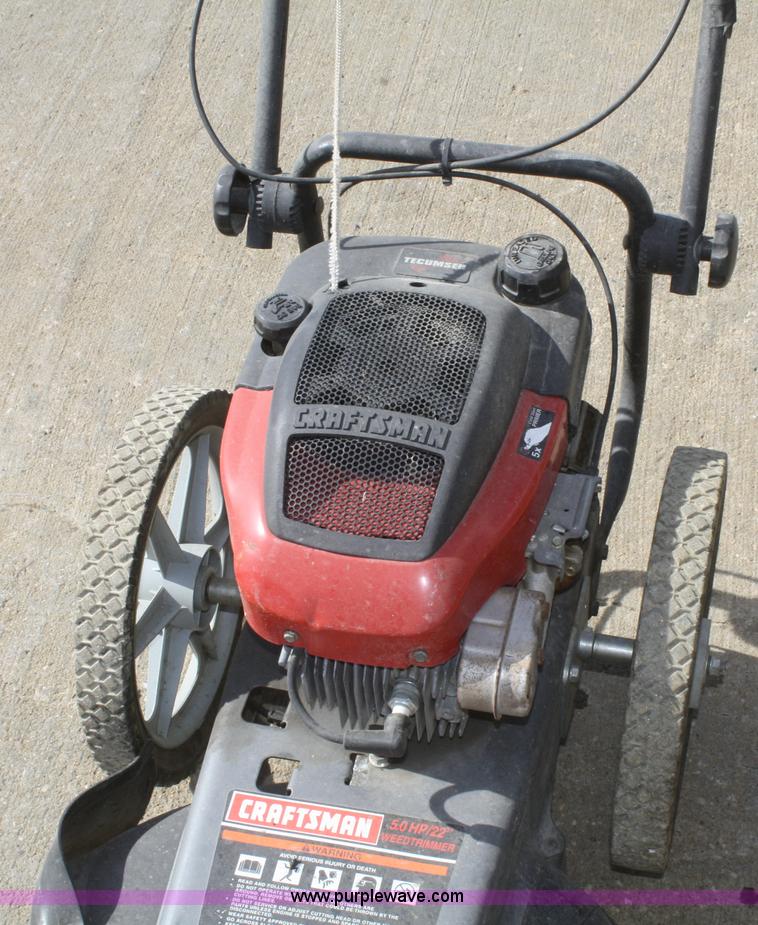 Craftsman 22" weed trimmer in Paola, KS Item U9705 sold Purple Wave