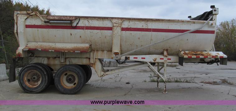 image for item E5632 2001 Ramco 24' barrel end dump trailer