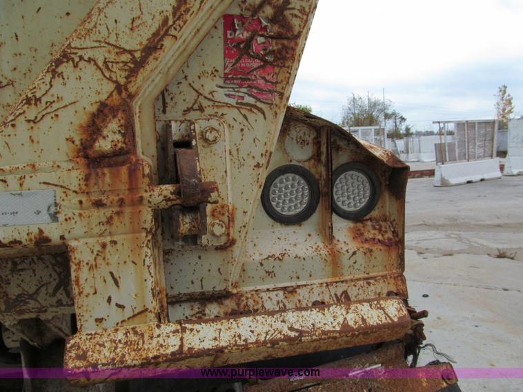 image for item E5632 2001 Ramco 24' barrel end dump trailer