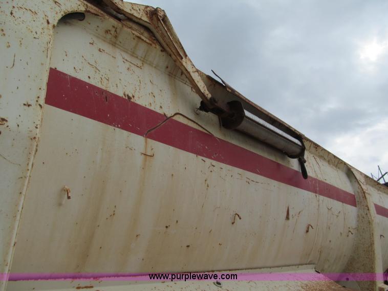 image for item E5632 2001 Ramco 24' barrel end dump trailer