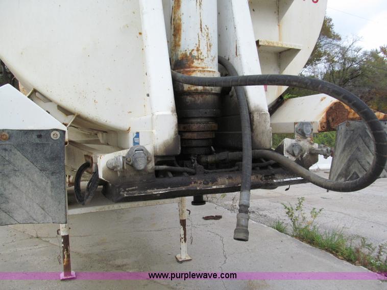 image for item E5632 2001 Ramco 24' barrel end dump trailer