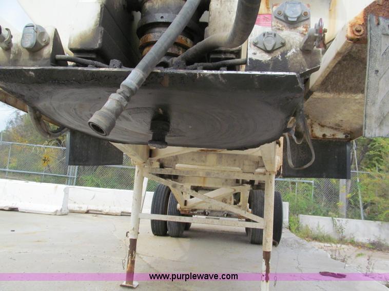 image for item E5632 2001 Ramco 24' barrel end dump trailer