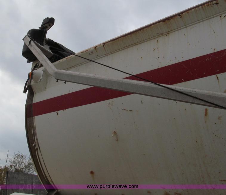 image for item E5632 2001 Ramco 24' barrel end dump trailer