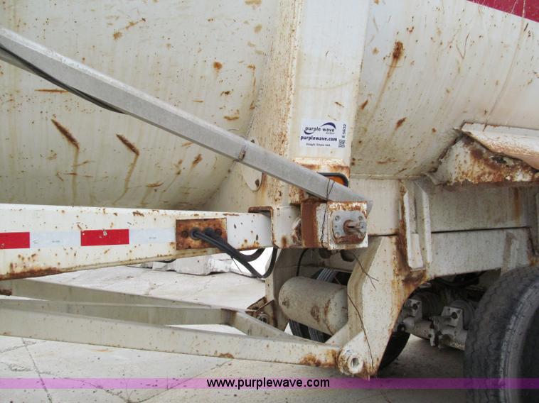 image for item E5632 2001 Ramco 24' barrel end dump trailer