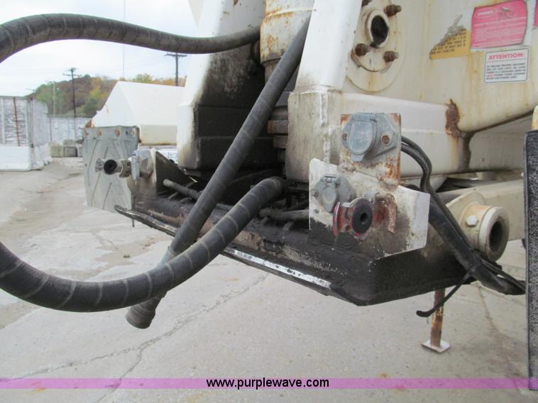 image for item E5632 2001 Ramco 24' barrel end dump trailer