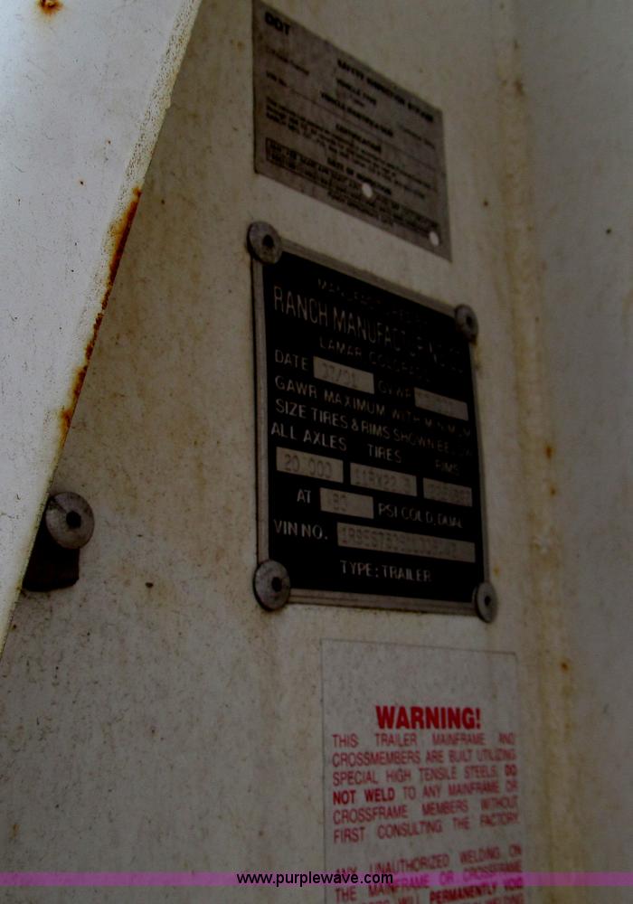 image for item E5632 2001 Ramco 24' barrel end dump trailer