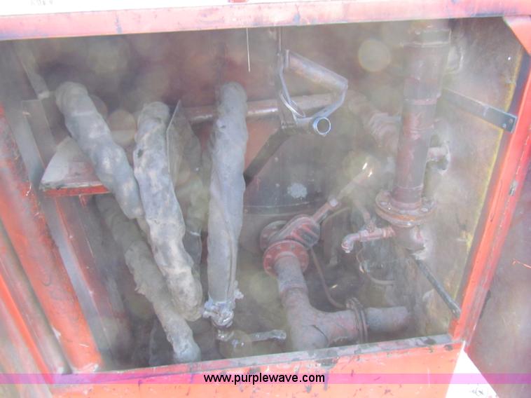 image for item E8159 2000 Craft Co E-Z Pour 200D crack seal machine