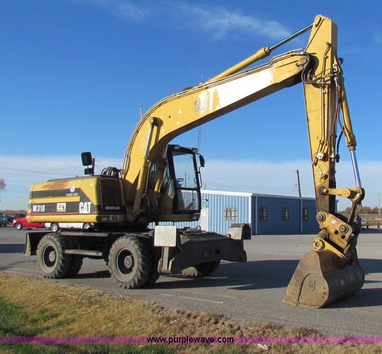 image for item E8168 1998 Caterpillar M318 mobile excavator