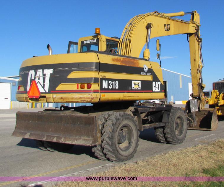 image for item E8168 1998 Caterpillar M318 mobile excavator