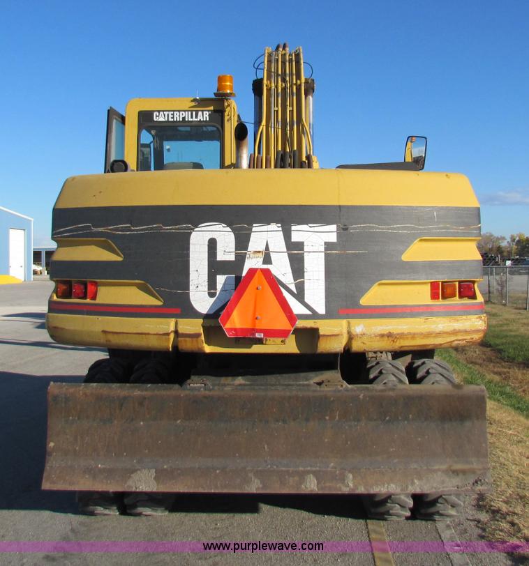 image for item E8168 1998 Caterpillar M318 mobile excavator